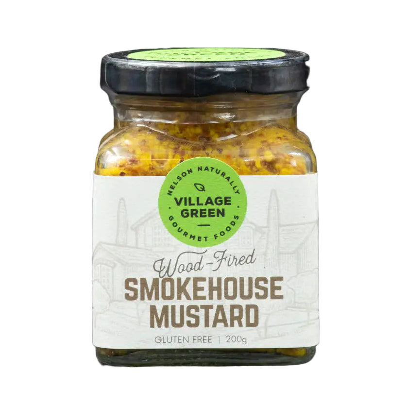 A jar of Village Green Wood-Fired Smokehouse Mustard against a black background.