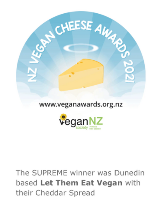 NZ Vegan Cheese Awards 2021 logo with a slice of cheese and branding elements detailing the Let Them Eat Vegan Cheddar Spread was 2021 Supreme overall winner