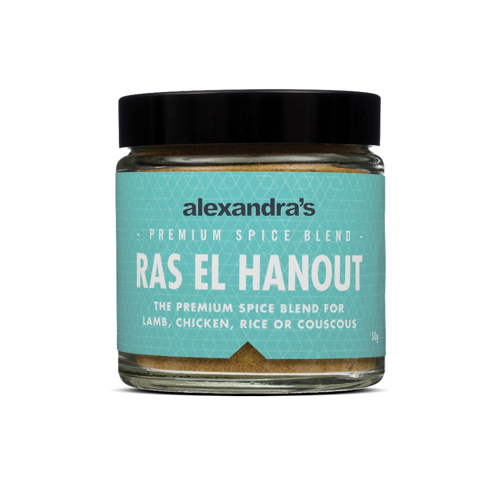 A jar of Alexandra's Ras el Hanout Spice Blend against a white background.