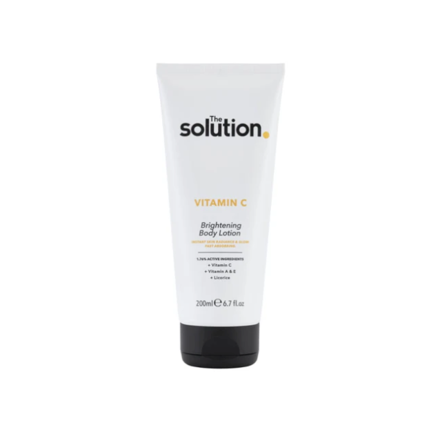 Tube of 'The Solution' Vitamin C Brightening Body Lotion on a white background