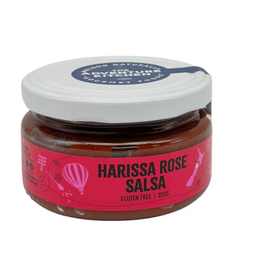 Jar of Adventure Kitchen Harissa Rose Salsa with a pink label on a white background