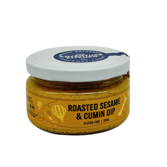 Jar of Adventure Kitchen roasted sesame and cumin dip with a white lid on a white background