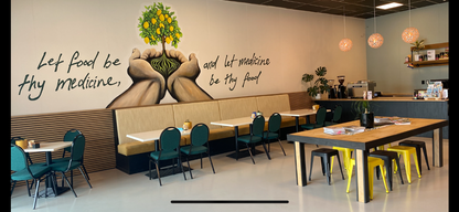 an image of the plantbased cafe seating and service counter