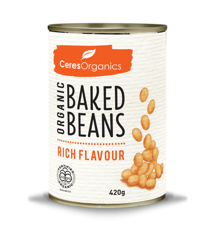 A can of Ceres Organics Baked Beans in Rich Flavour. The can is labeled with the brand name and the product name, and it's indicated that the product is organic.