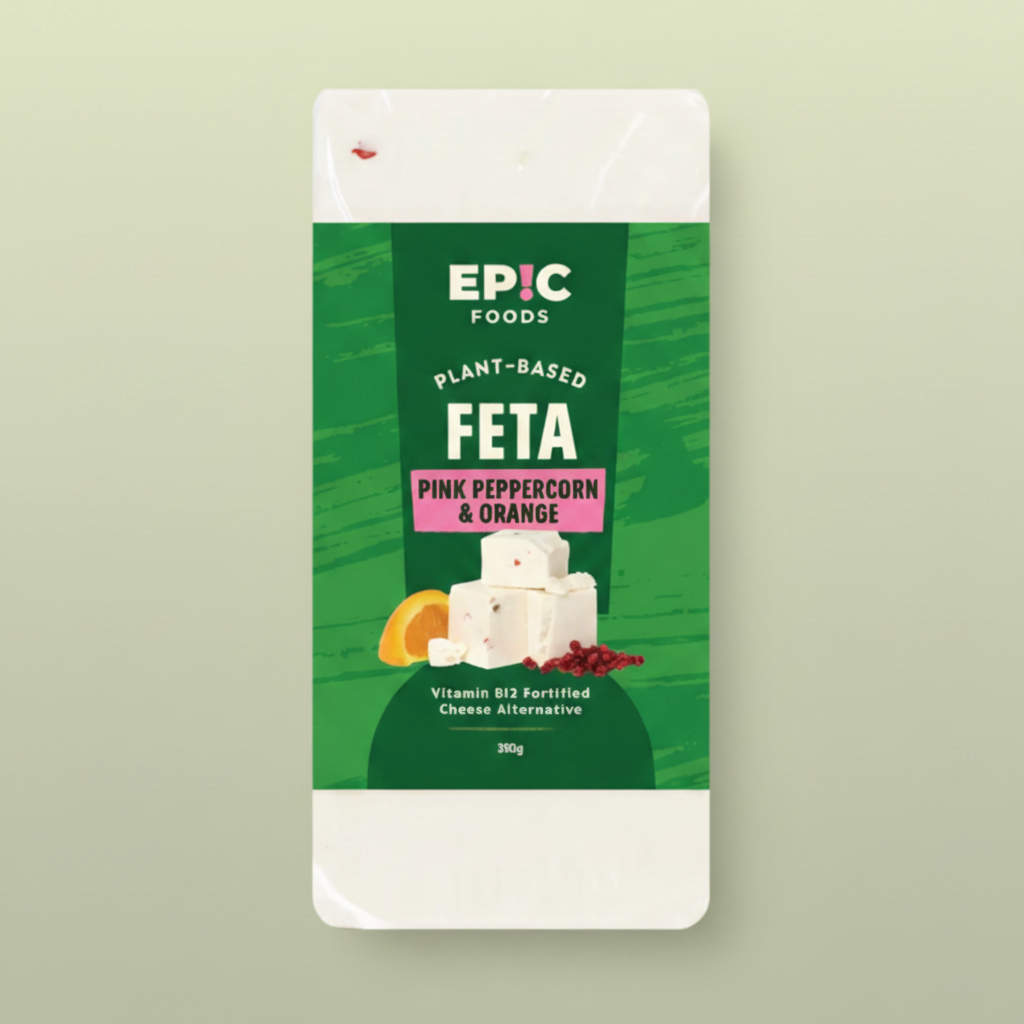 Packaging of Epic Foods plant-based feta cheese with pink peppercorn and orange flavor on a green background.
