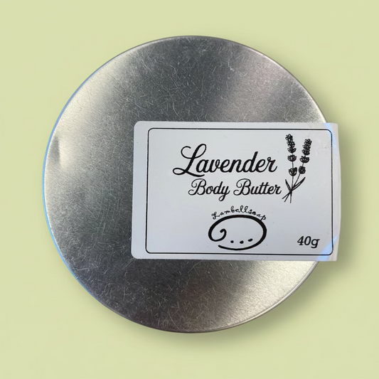 Lavender body butter container with a label on a wooden surface