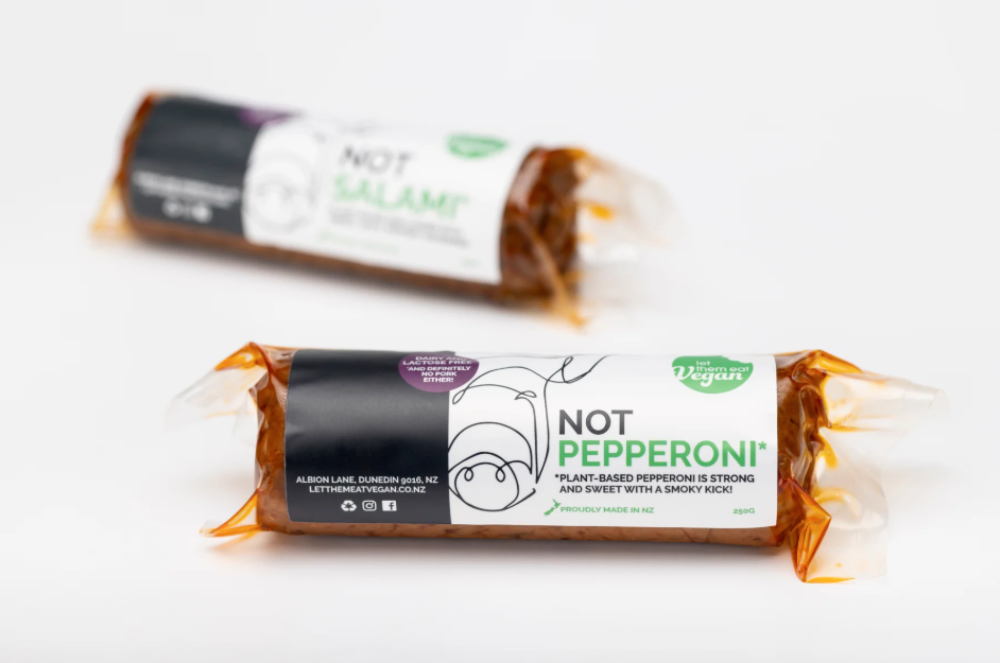 Two packages of Let Them Eat Vegan NOT Pepperoni on a white background