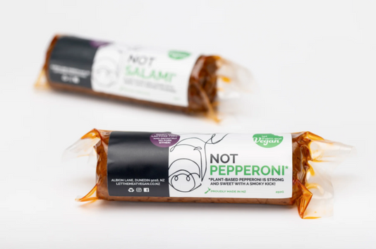 Two packages of Let Them Eat Vegan NOT Pepperoni on a white background