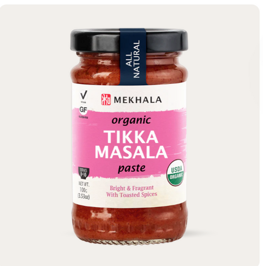 Jar of Mekhala organic Tikka Masala paste on a white background
