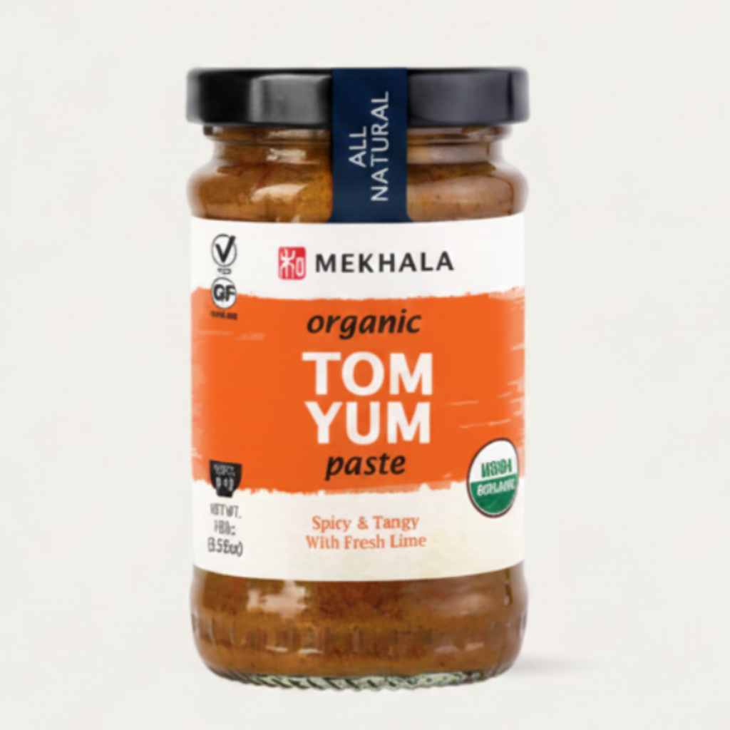 Jar of Mekhala organic Tom Yum paste on a white background