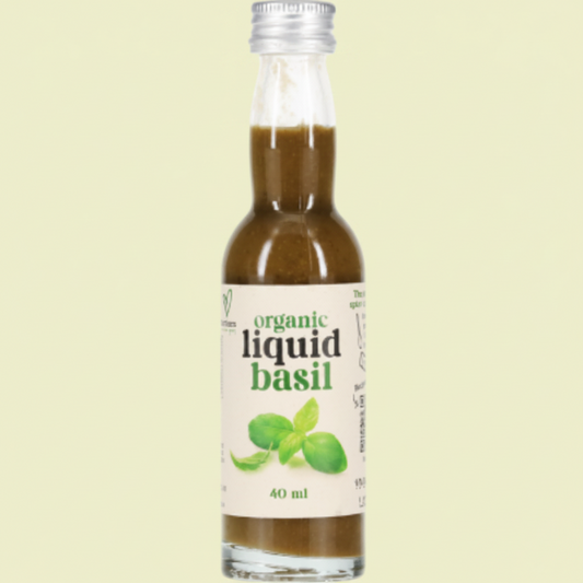 Bottle of organic liquid basil on a white background