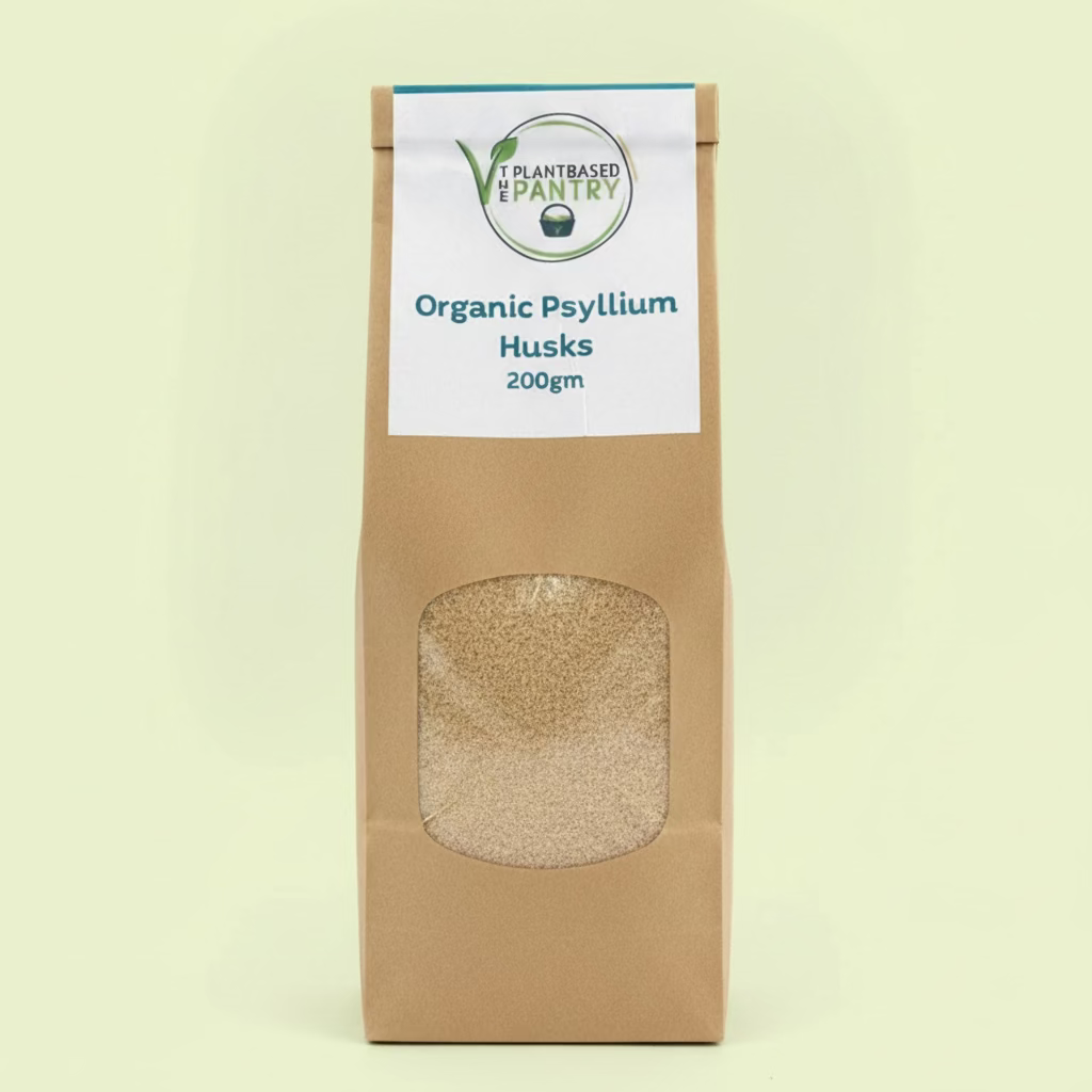 The Plantbased Pantry branded paper bag of organic psyllium husks with 'Plant-Based Pantry' label on a neutral background
