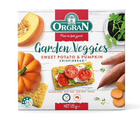 Box of Orgran Garden Veggies Sweet Potato & Pumpkin Crispbread with images of pumpkins, sweet potatoes, and a cracker with tomatoes.