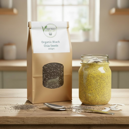 Bag of PBPantry organic black chia seeds with a visible brand label on a wooden surface
