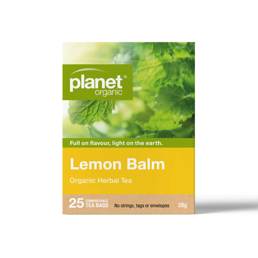 Planet Organic Lemon Balm tea package with green leaves on a white background