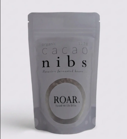 Package of cacao nibs by ROAR on a white background