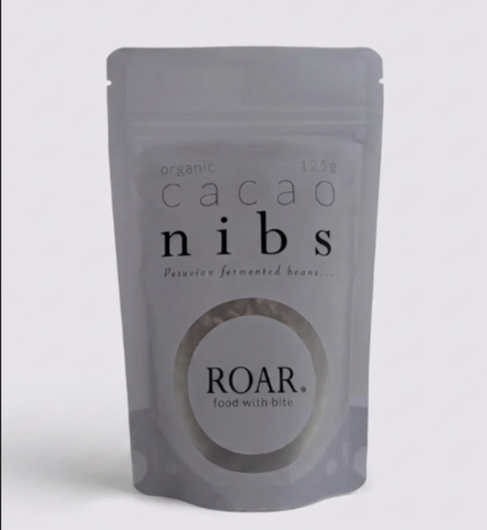 Package of cacao nibs by ROAR on a white background