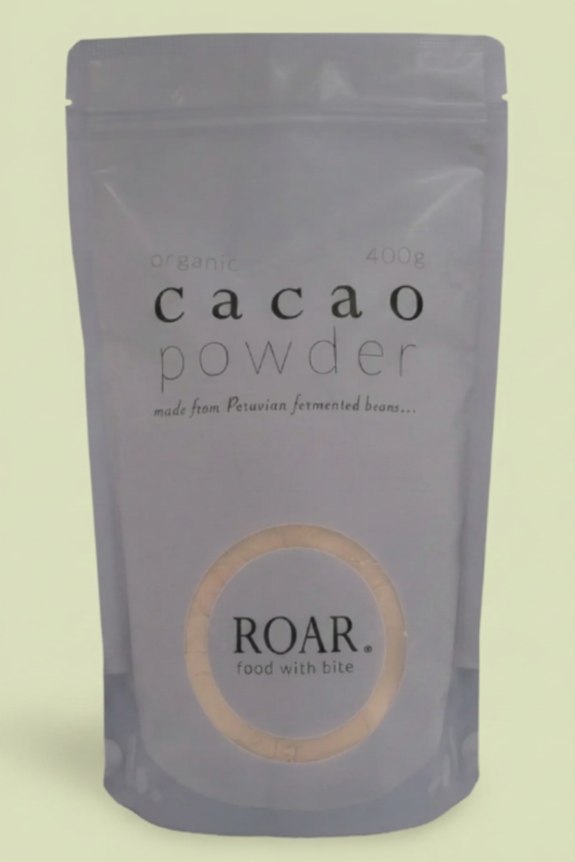 Package of cacao powder by ROAR on a white background