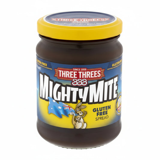 Jar of Three Threes Mighty Mite gluten-free spread with a yellow lid on a white background
