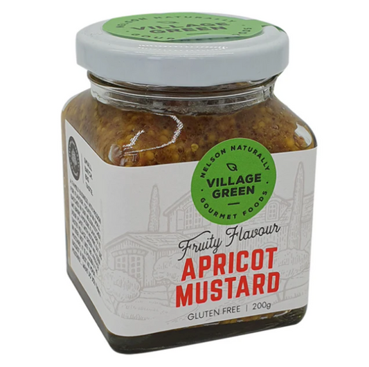 Jar of apricot mustard with 'Village Green' label on a white background
