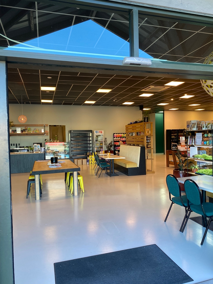 photo looking into the plantbased  cafe from just outside the front door