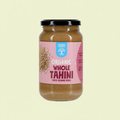 A jar of Chantal Organic Whole Tahini with the label showing the brand name and the product name, indicating that it is made from 100% sesame seeds.